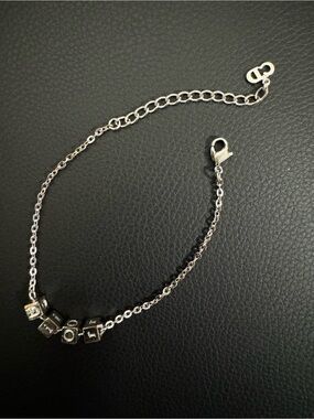 Authentic Dior Spell Out Cube Charm Bracelet